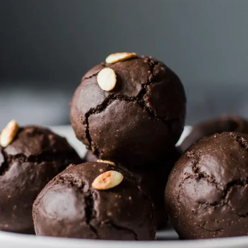 Close-up of chocolate dairy soy free energy bites showing natural texture